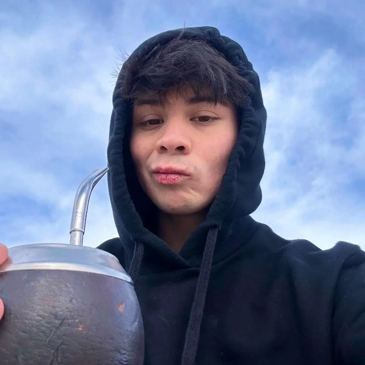 A selfie of me drinking mate.